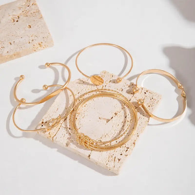 Elegante Knotete Armband Set in Gold