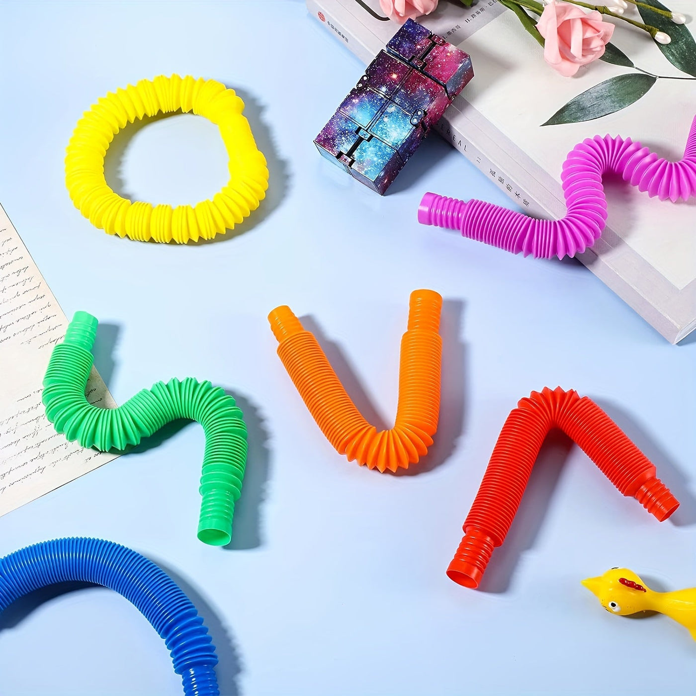 2 Stück Bunte Elastische Pop-Rohre – Sensorische Dehnen- & Quietscht-Spielzeuge