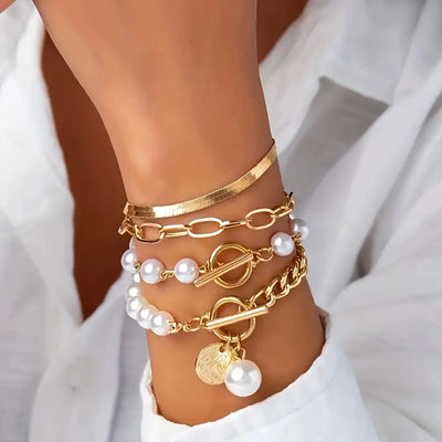 Elegantes 4-teiliges Armbandset in Gold – Schlange, Perlen & Glieder