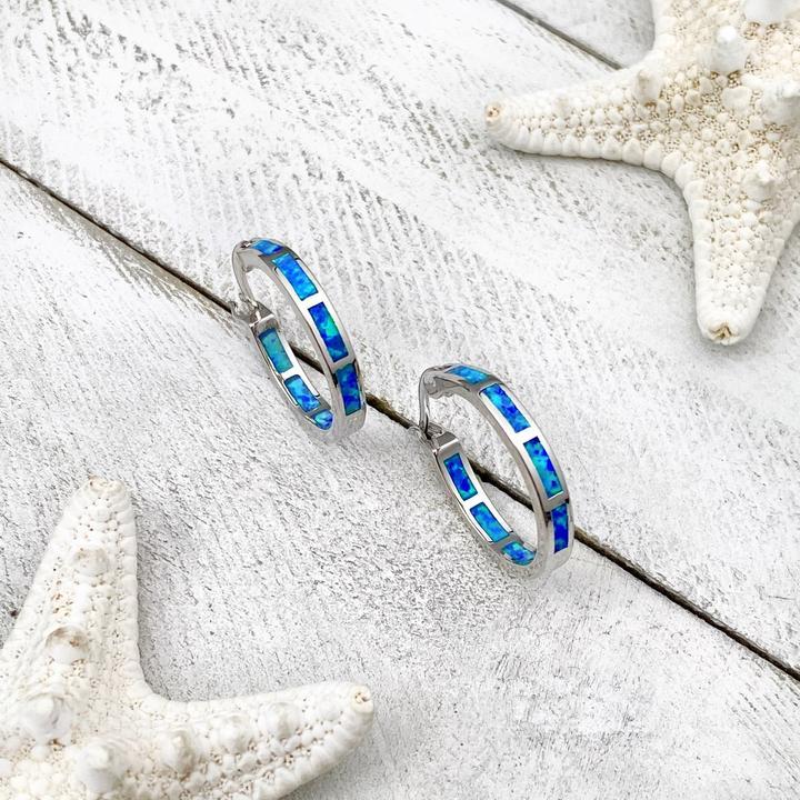 Blaue ozeanische Opalohrringe aus Silber