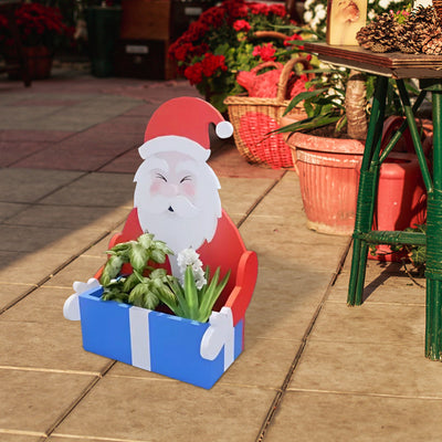 Blumentopf im Weihnachtsmann-Design