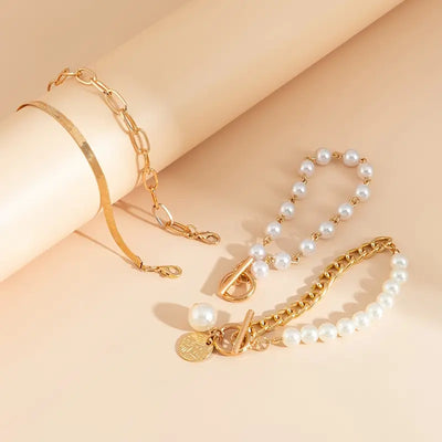 Elegantes 4-teiliges Armbandset in Gold – Schlange, Perlen & Glieder