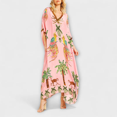 Linda - Elegantes Kleid mit asymmetrischen Schultern und Kokosnussbaum-Muster