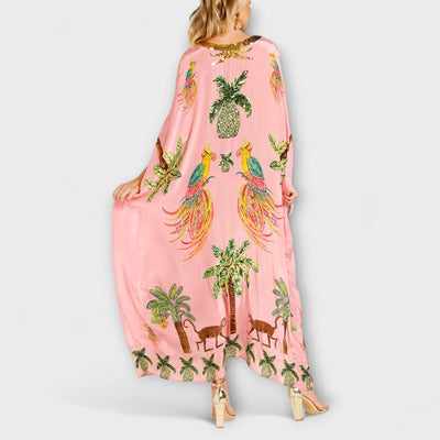 Linda - Elegantes Kleid mit asymmetrischen Schultern und Kokosnussbaum-Muster